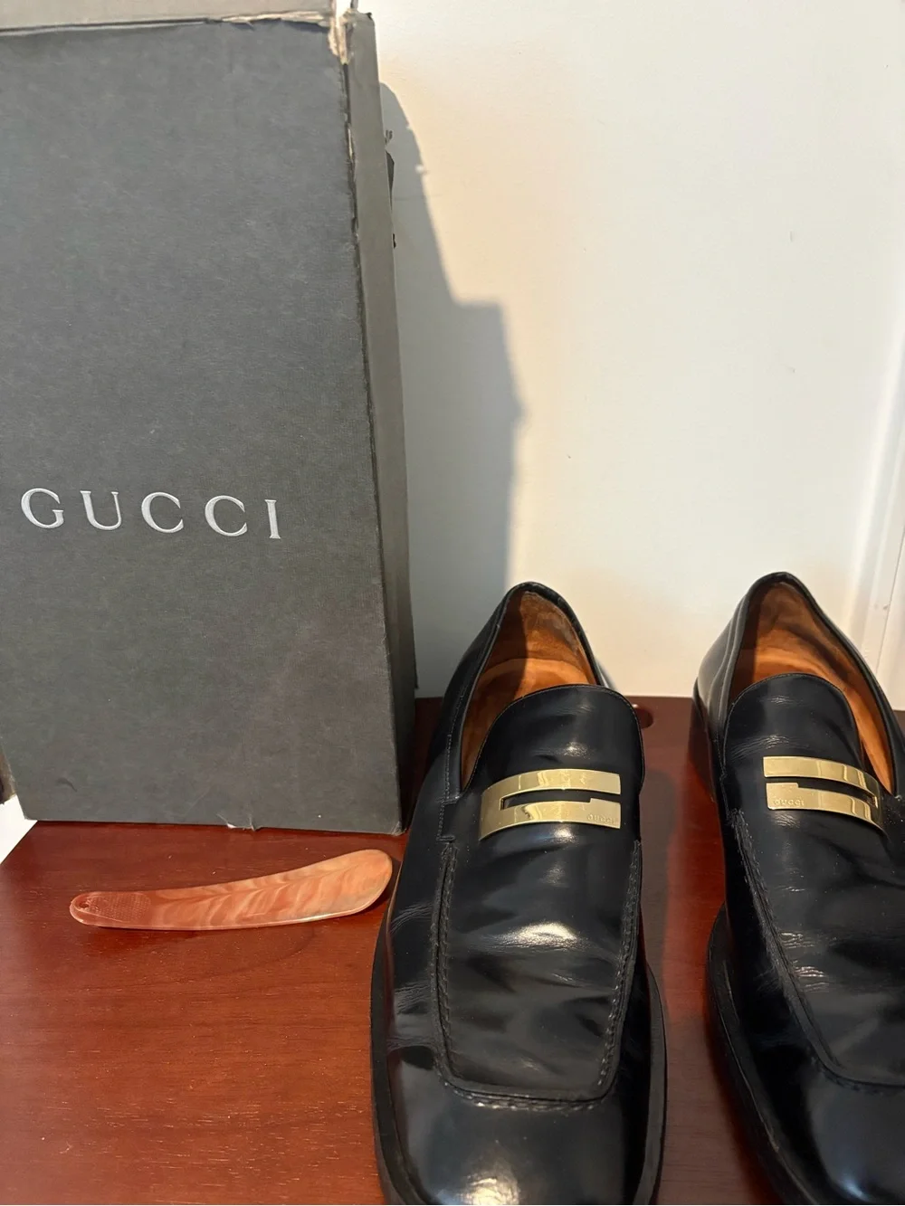 Gucci Black Leather Slip-On Loafers with Gold Plaque